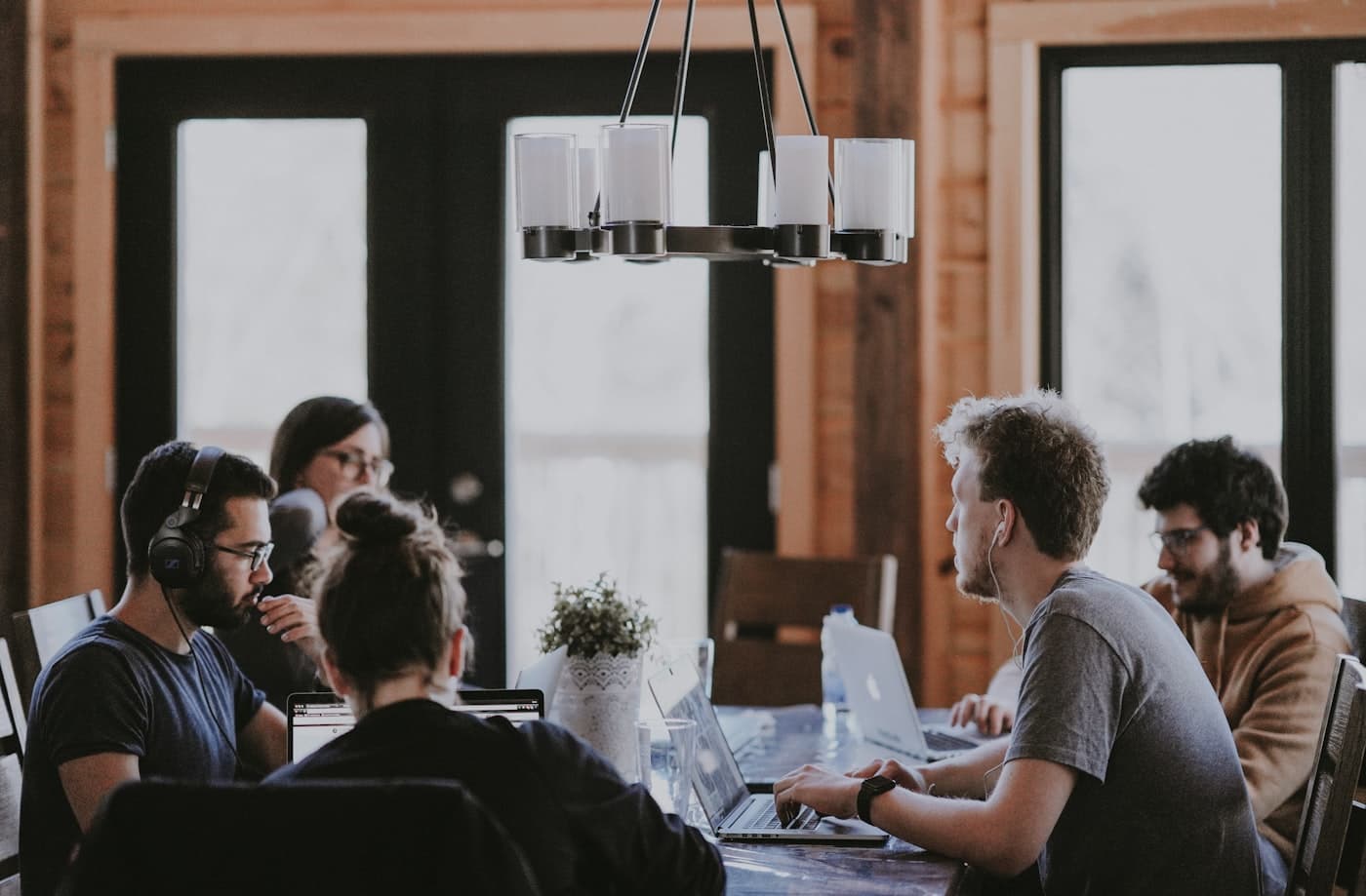 A small team working together around a table